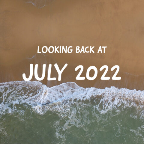 image of a beach with the words Looking Back at July 2022